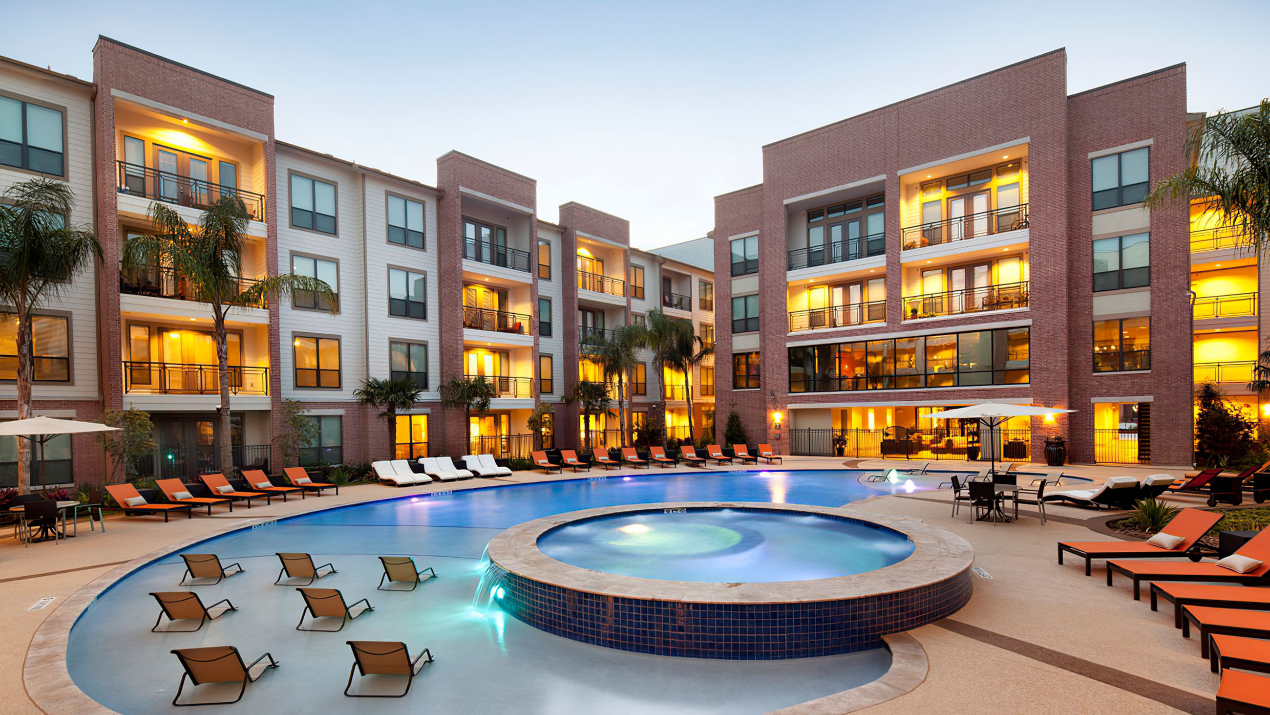 pool area surrounded by apartment units of one of The Tipton Group properties